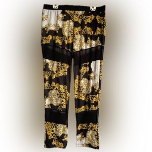 Multicolored women’s pants with mesh inserts. Size 2X (plus size)